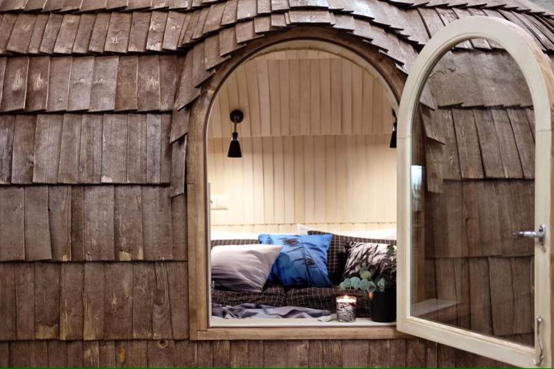 a window in a house with a couch in it at SkyFall in Woodbridge