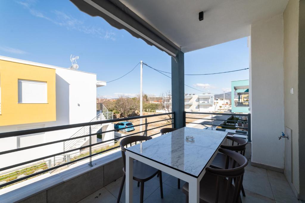 Balkón nebo terasa v ubytování Danai & Palm Residential Complexes