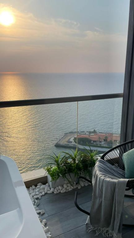 a balcony with a view of the ocean at برج داماك الجوهرة جدة - Damac al jawharah tower in Jeddah