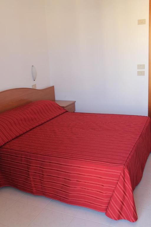 Postel nebo postele na pokoji v ubytování Hotel Vienna