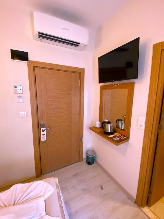 Postel nebo postele na pokoji v ubytování Zeyn Otel Istanbul