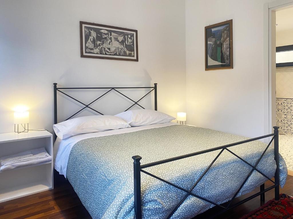 Ένα ή περισσότερα κρεβάτια σε δωμάτιο στο B&B Al Pergolato