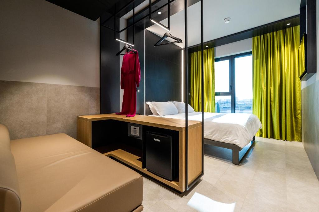 Postel nebo postele na pokoji v ubytování Smart Hotel Central