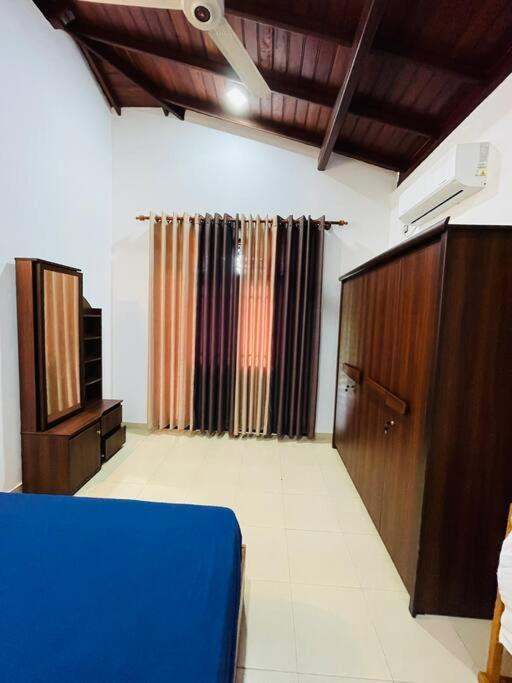 Postel nebo postele na pokoji v ubytování sunset villa