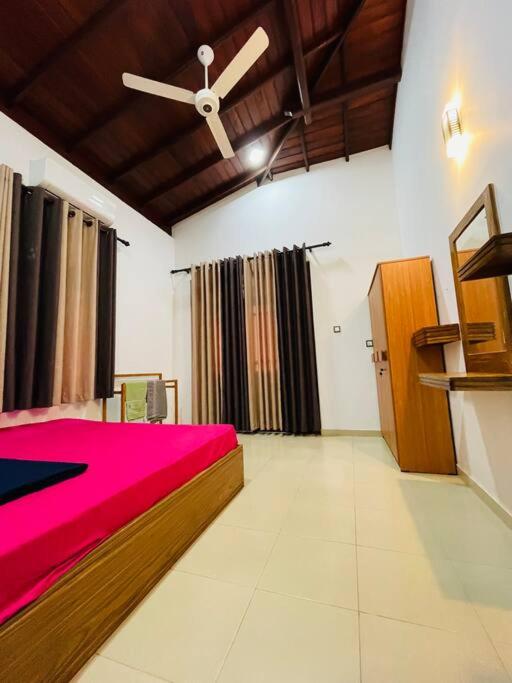 Postel nebo postele na pokoji v ubytování sunset villa