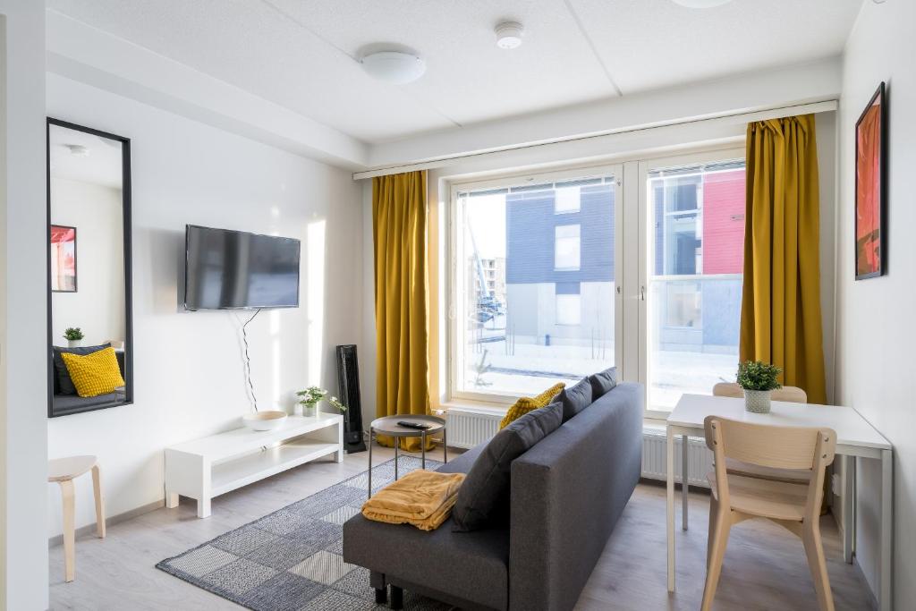 Posezení v ubytování Hiisi Homes Kirkkonummi Masala Seppä-Kallen kuja