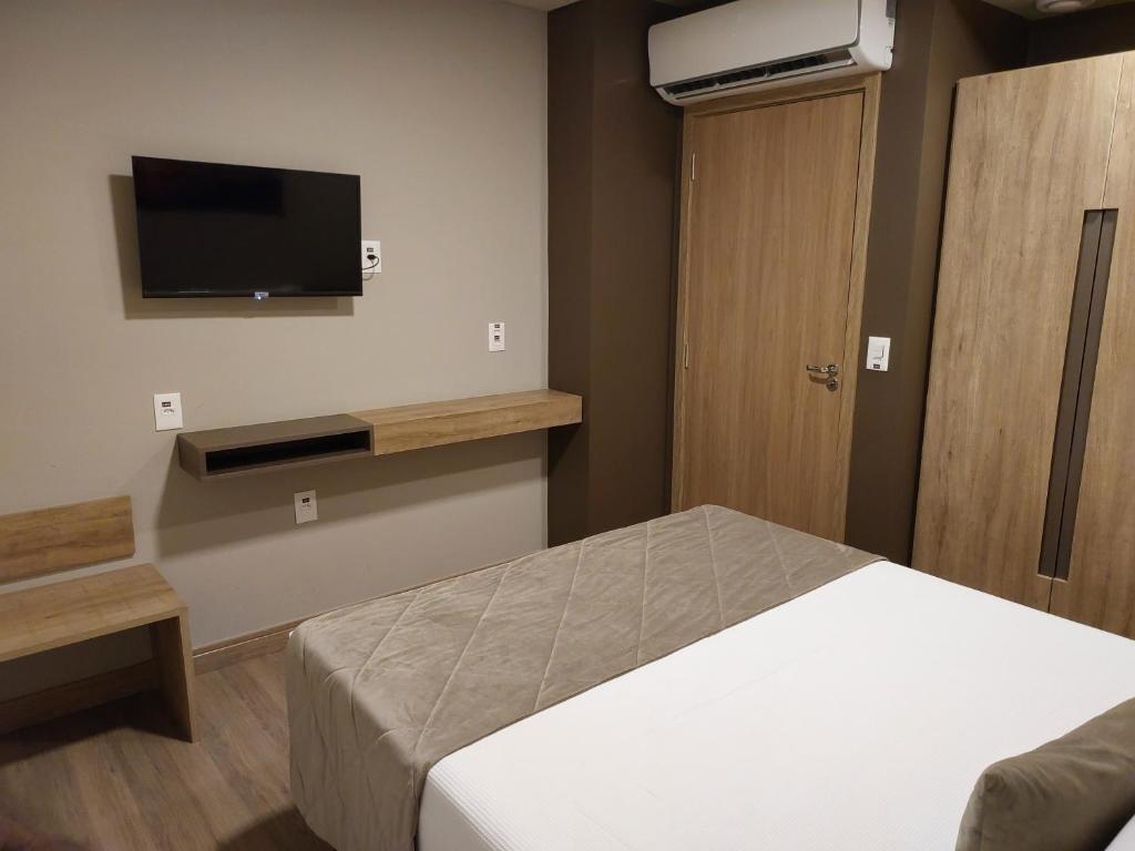 Postel nebo postele na pokoji v ubytování Golden Gramado Resort
