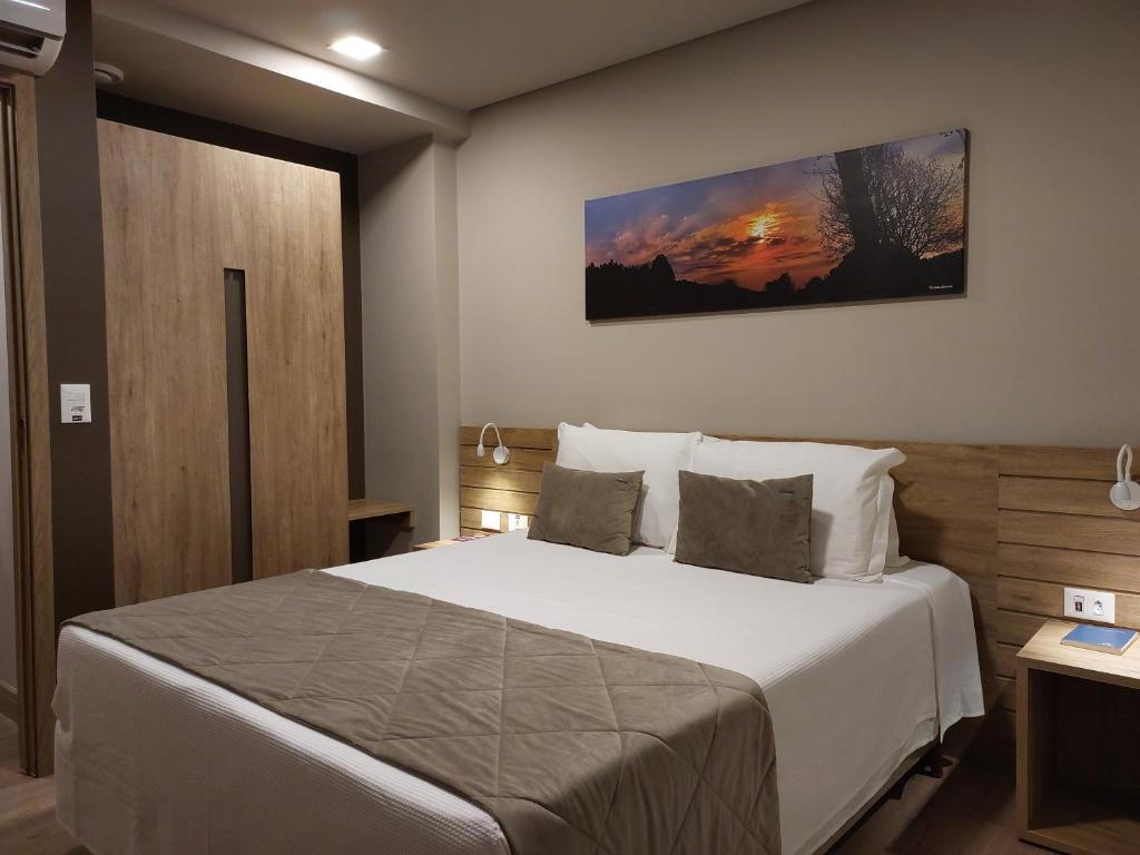 Postel nebo postele na pokoji v ubytování Golden Gramado Resort