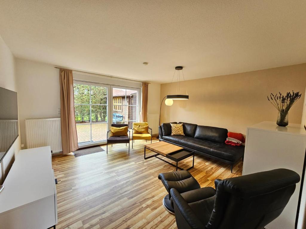 Χώρος καθιστικού στο Ferienhaus Nici Wohneinheit Seehund