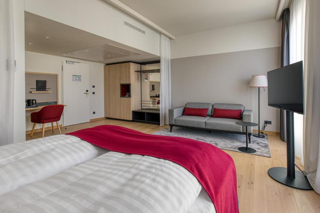 Postel nebo postele na pokoji v ubytování IntercityHotel Berlin Airport BER Terminal 1 & 2