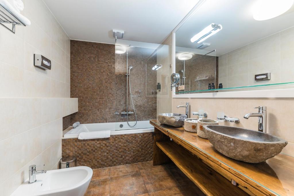 Vannituba majutusasutuses Wellness & spa hotel Augustiniánský dům