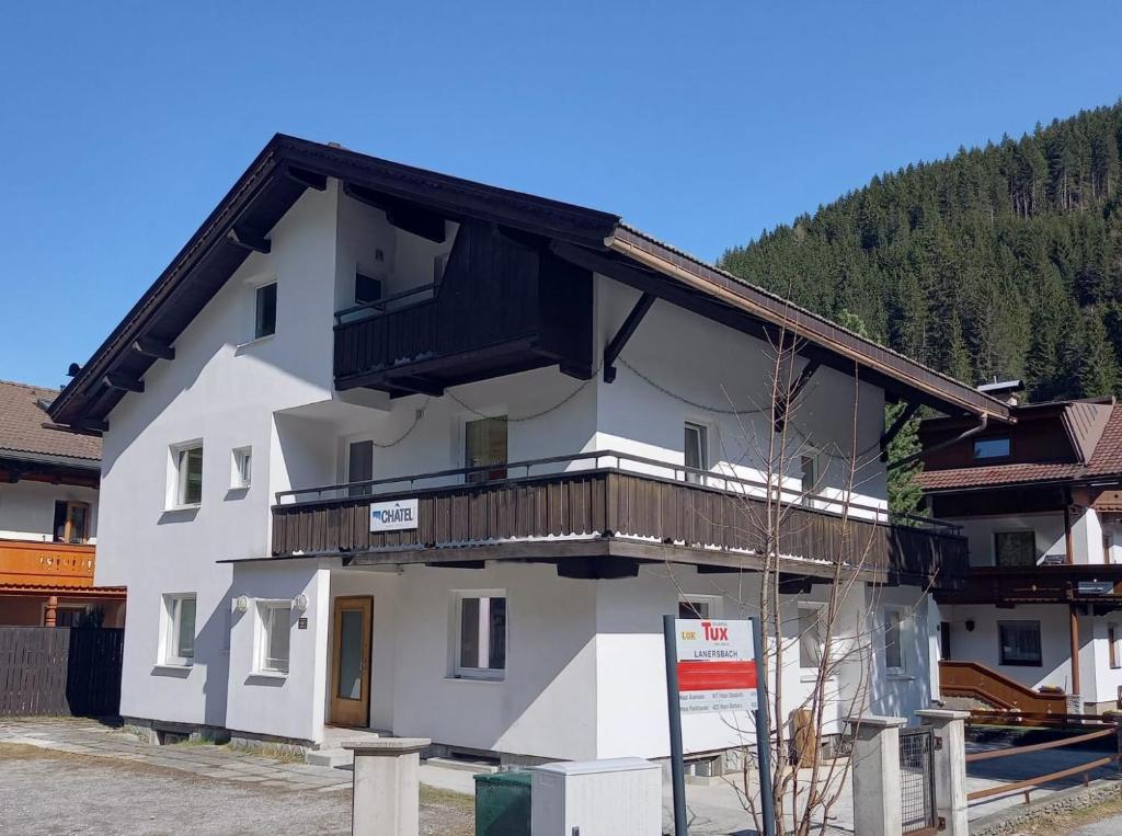 a large white building with a balcony on it at Haus Irmgard by Châtel Reizen in Tux