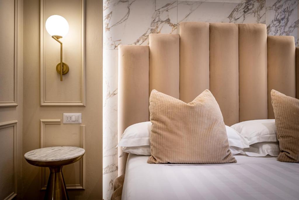 Postel nebo postele na pokoji v ubytování Hotel Emma Small Luxury Hotel
