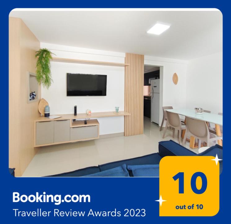 TV a/nebo společenská místnost v ubytování Casa confortável à 568m da praia de Ponta Negra