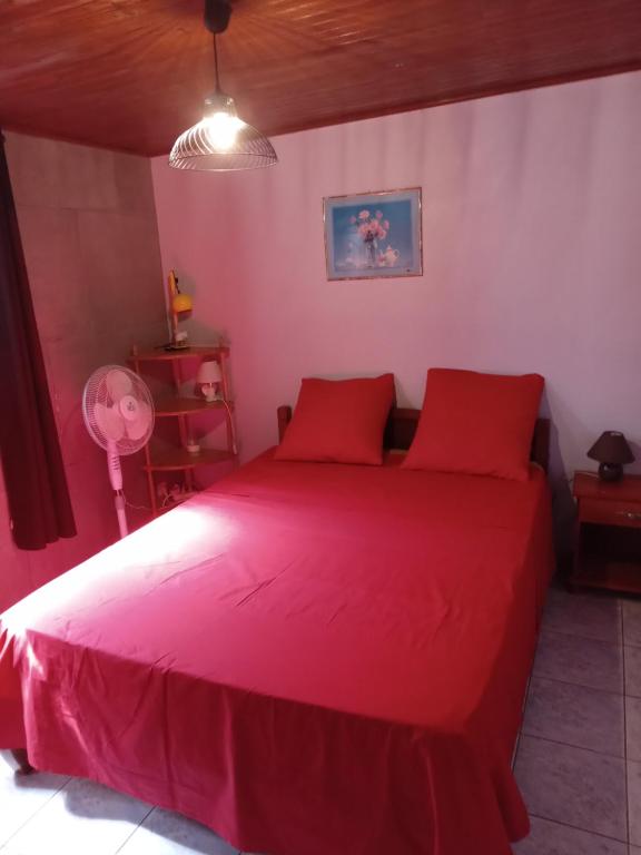 Postel nebo postele na pokoji v ubytování Le calme