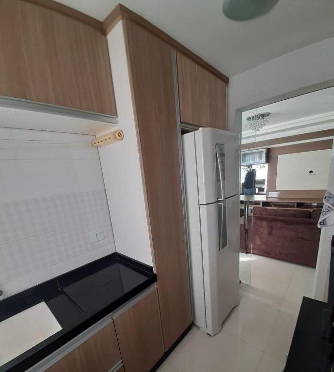 Kuchyň nebo kuchyňský kout v ubytování Apartamento inteiro com garagem coberta Treviso