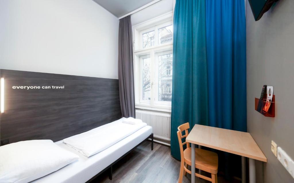 Posteľ alebo postele v izbe v ubytovaní a&o Wien Stadthalle