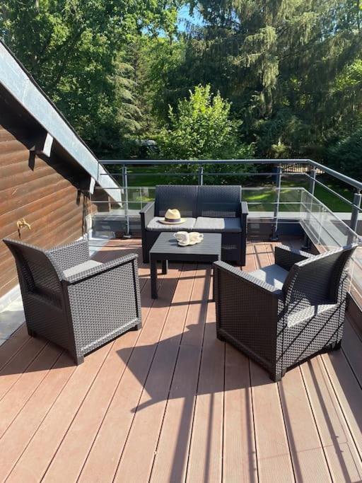Posedenie v ubytovaní Magnifique lodge dans la forêt de Fontainebleau