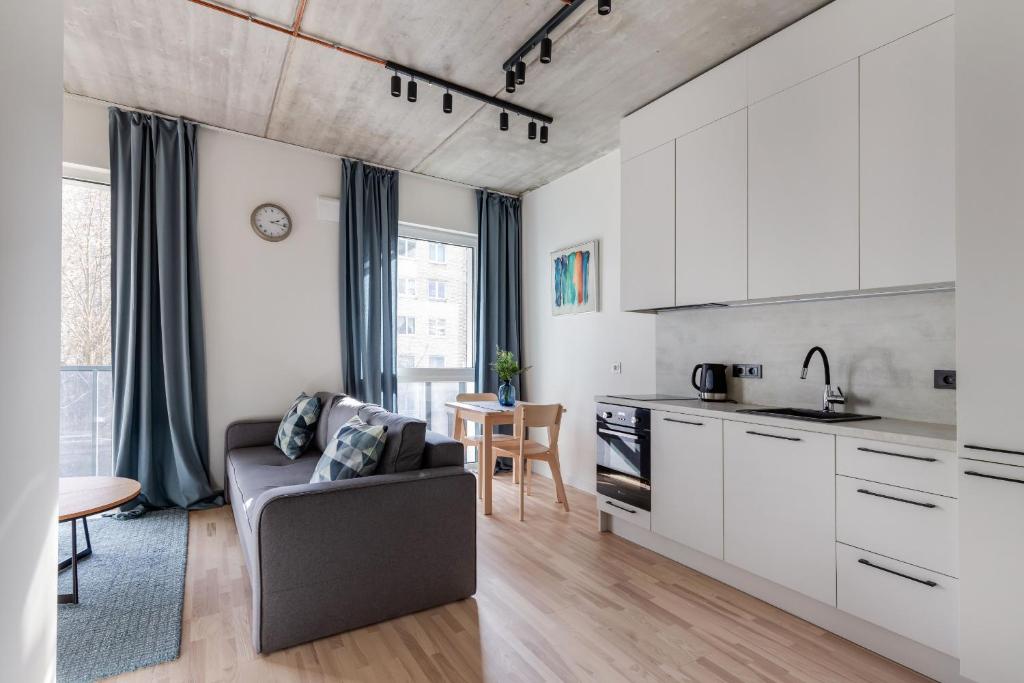 Kjøkken eller kjøkkenkrok på White Lotus Apartments by Reside Baltic