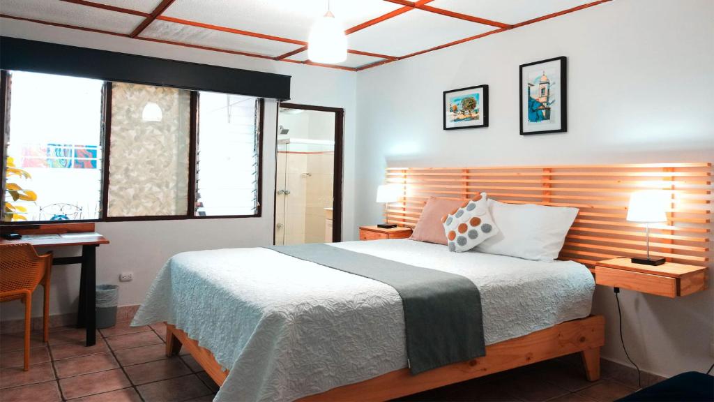 Postel nebo postele na pokoji v ubytování Trebol Amarillo Bed & Breakfast
