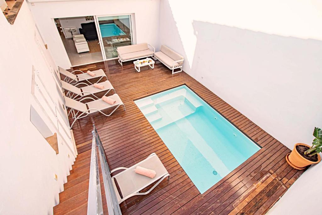 an overhead view of a swimming pool in a house at Villa Casa Puerto by Sealand Villas in Port de Pollensa