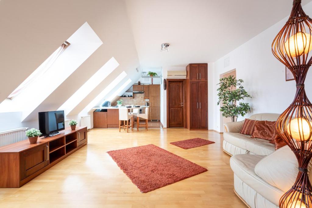 A television and/or entertainment centre at Beautiful apartment with AC