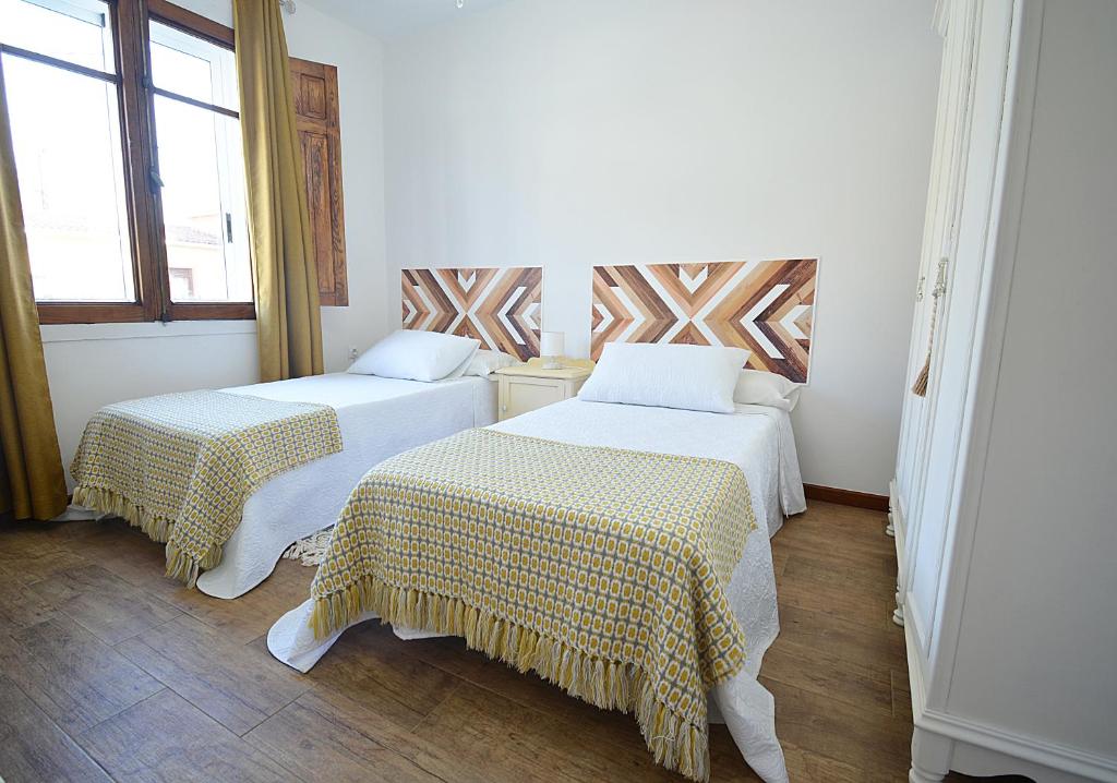 Postel nebo postele na pokoji v ubytování Casa Felisa - Vilagarcía de Arousa