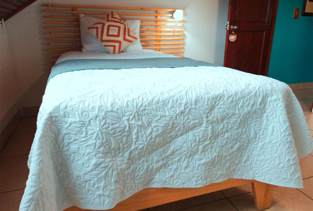 Postel nebo postele na pokoji v ubytování Trebol Amarillo Bed & Breakfast