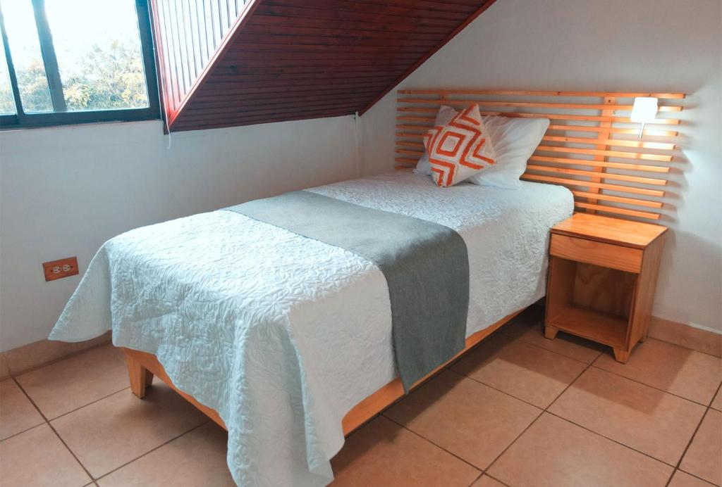 Postel nebo postele na pokoji v ubytování Trebol Amarillo Bed & Breakfast