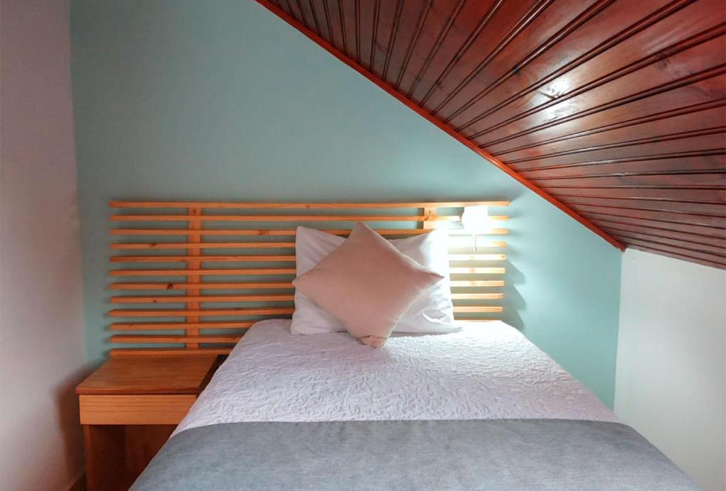 Postel nebo postele na pokoji v ubytování Trebol Amarillo Bed & Breakfast