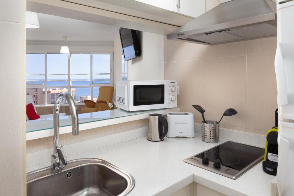 Kuchnia lub aneks kuchenny w obiekcie Seaviews A61