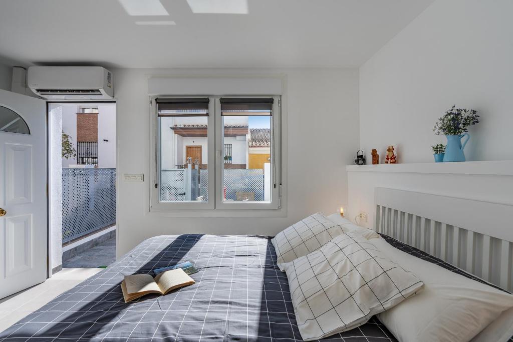 Postel nebo postele na pokoji v ubytování Loft A'ca La Puri en Melegís