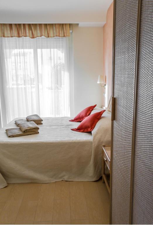 Postel nebo postele na pokoji v ubytování Hotel Derby Exclusive