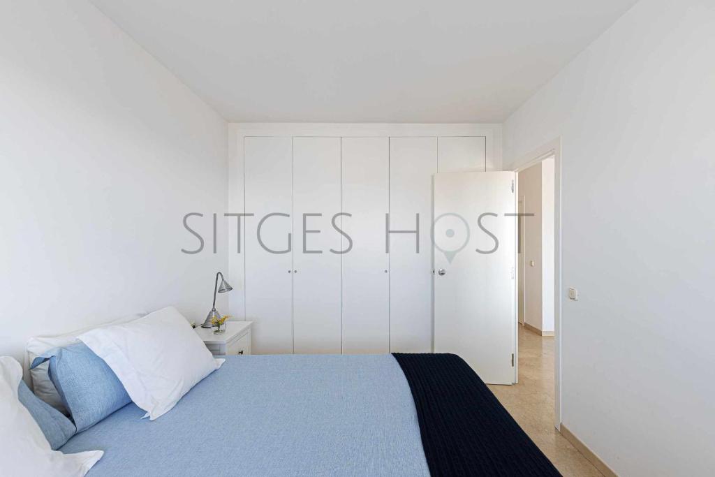 Posteľ alebo postele v izbe v ubytovaní Sitges ARENA dos piscinas frente al mar