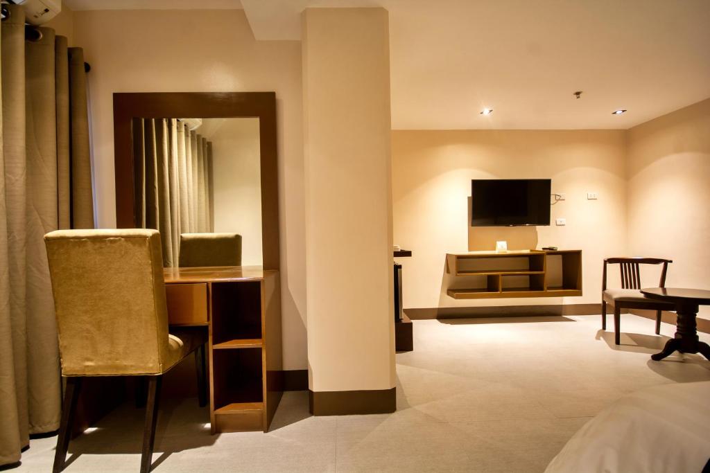 TV a/nebo společenská místnost v ubytování ECL Resort Hotel Boracay