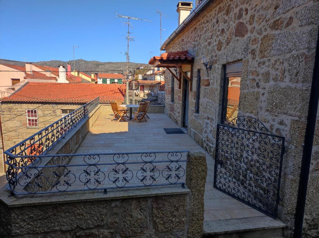 a balcony of a building with a railing at Casa Cruz 