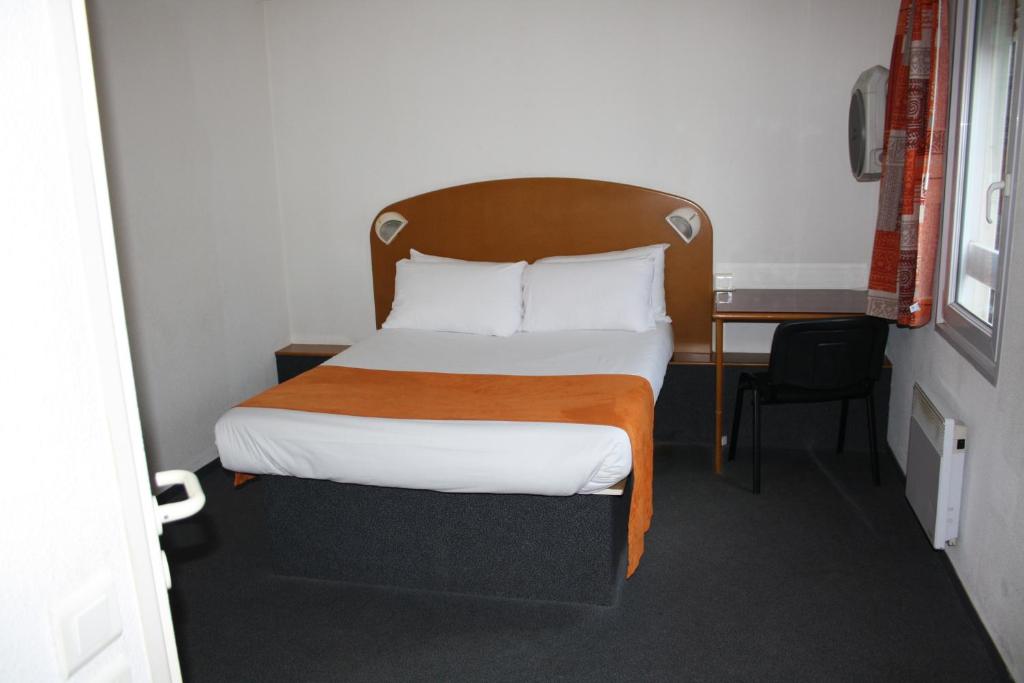 Postel nebo postele na pokoji v ubytování Hôtel Quick Palace Valence Nord