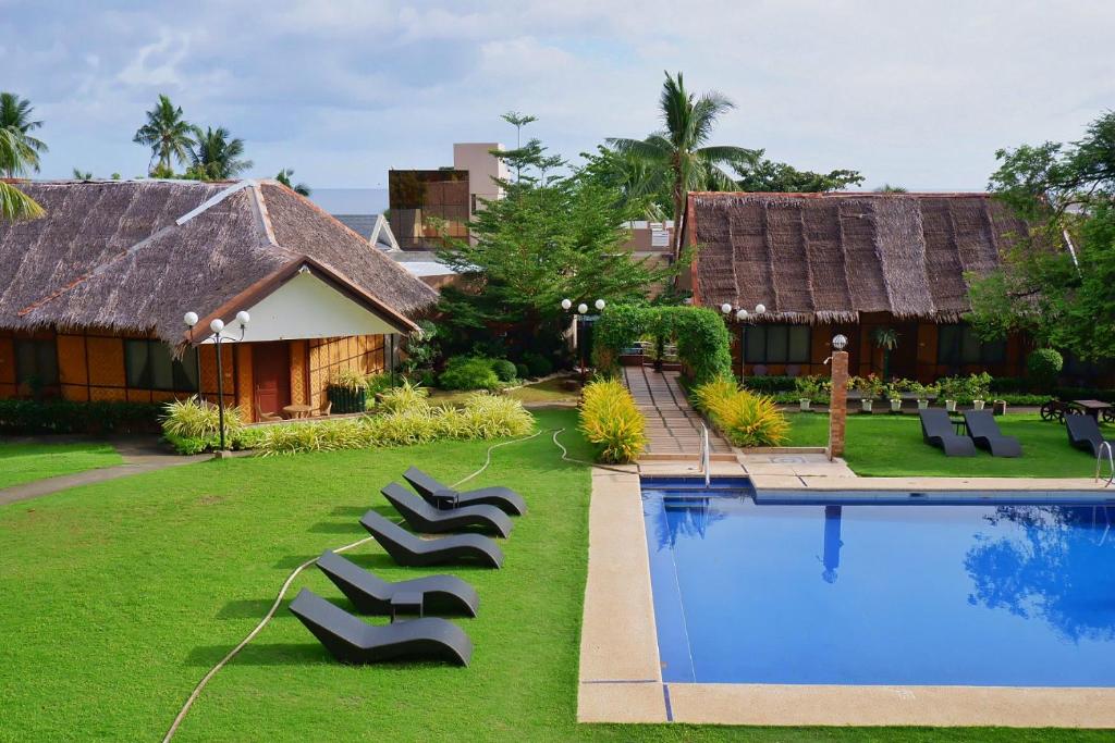 VILLA TOMASA ALONA KEW BEACH RESORT PROMO B: WITH AIRFARE PROMO bohol Packages