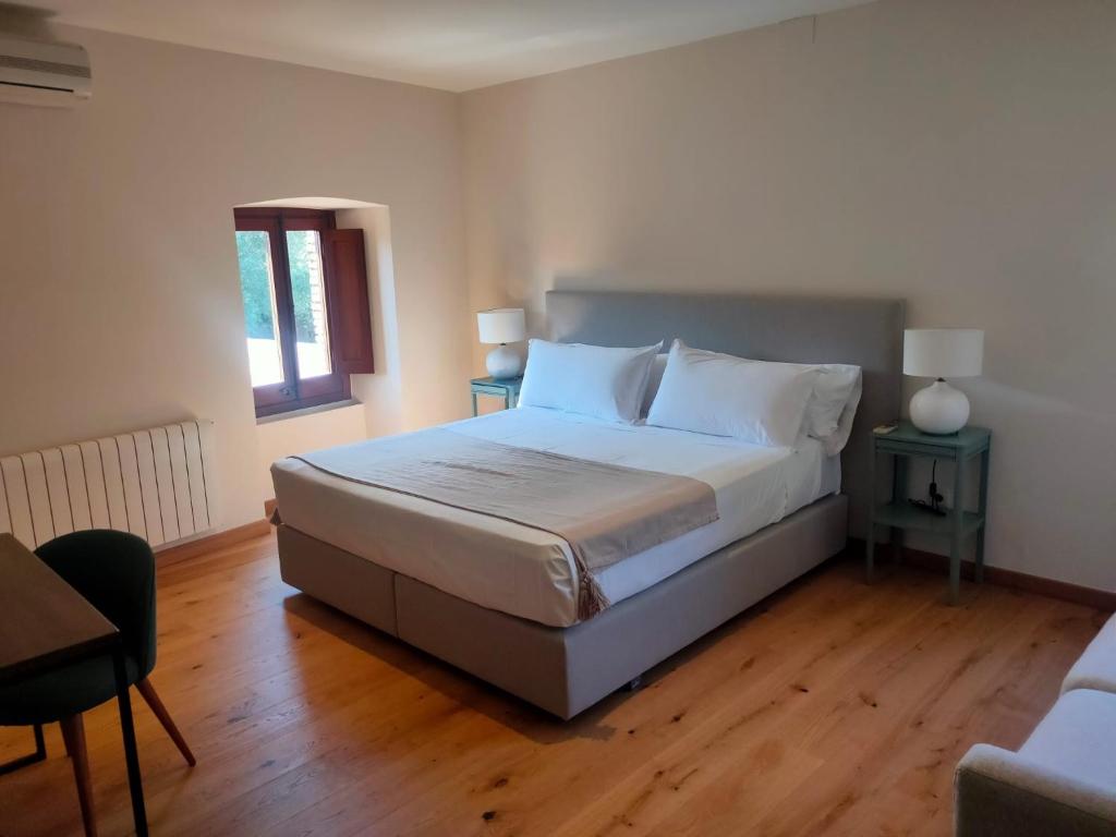 Postel nebo postele na pokoji v ubytování Hotel Mas del Sol