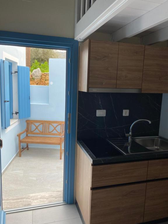 Kuchyň nebo kuchyňský kout v ubytování Aleminas Rooms