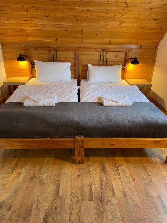 Postel nebo postele na pokoji v ubytování Apartmány Modrý Dom