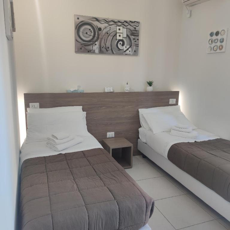 Posteľ alebo postele v izbe v ubytovaní B&B AMISTANZA