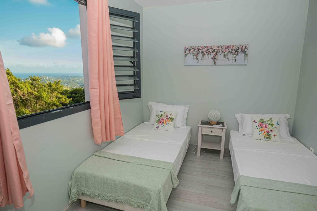 Postel nebo postele na pokoji v ubytování VT cottage