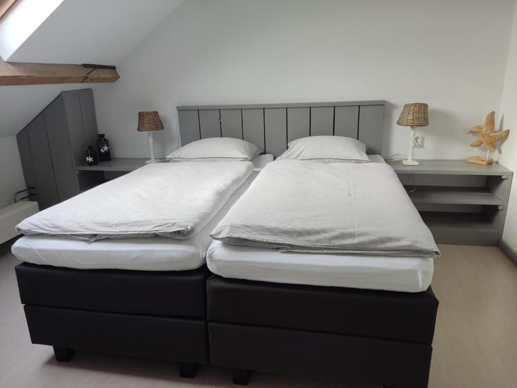 Postel nebo postele na pokoji v ubytování B&B Bouwmanshoeve
