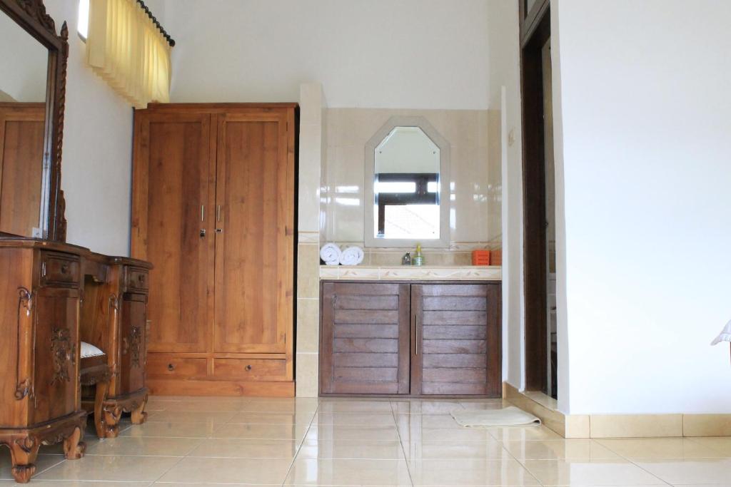 Kuchyň nebo kuchyňský kout v ubytování Tanah Semujan Ubud