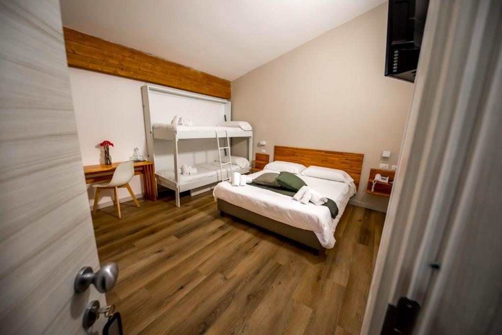 Postel nebo postele na pokoji v ubytování Parco Hotel Granaro