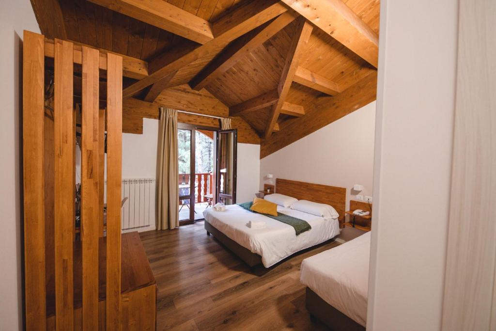 Postel nebo postele na pokoji v ubytování Parco Hotel Granaro
