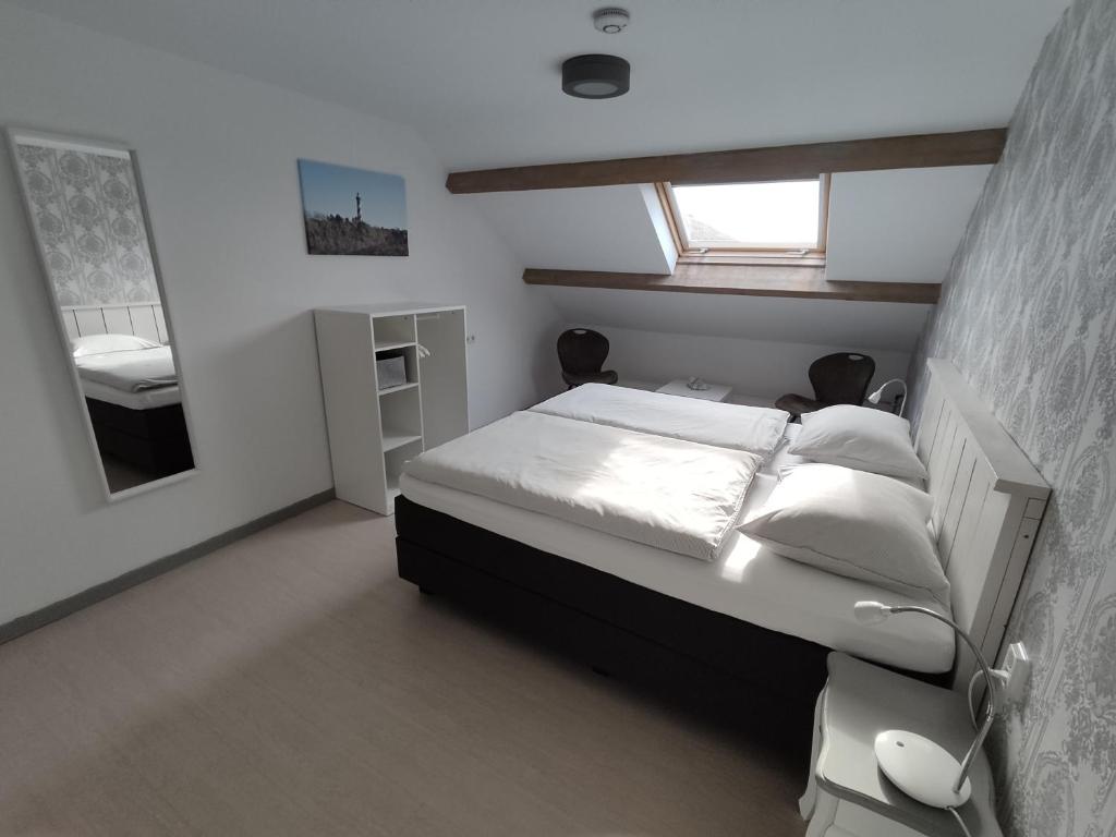 Postel nebo postele na pokoji v ubytování B&B Bouwmanshoeve