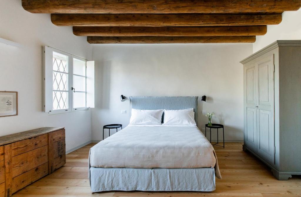 Postel nebo postele na pokoji v ubytování Casa Perazzolo
