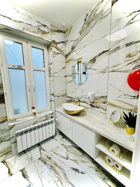 Kúpeľňa v ubytovaní Apartament z jacuzzi - Centrum Szczytna Mazury